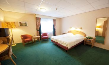 Bild von Komfort Zimmer mit Badewanne