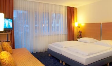 Bild von Dreibettzimmer