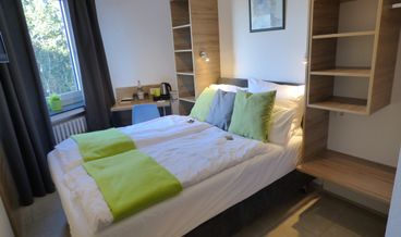 Bild von Kamer met kingsize bed