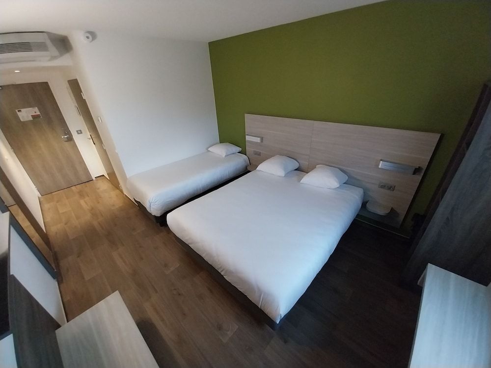 Bild von Dreibettzimmer