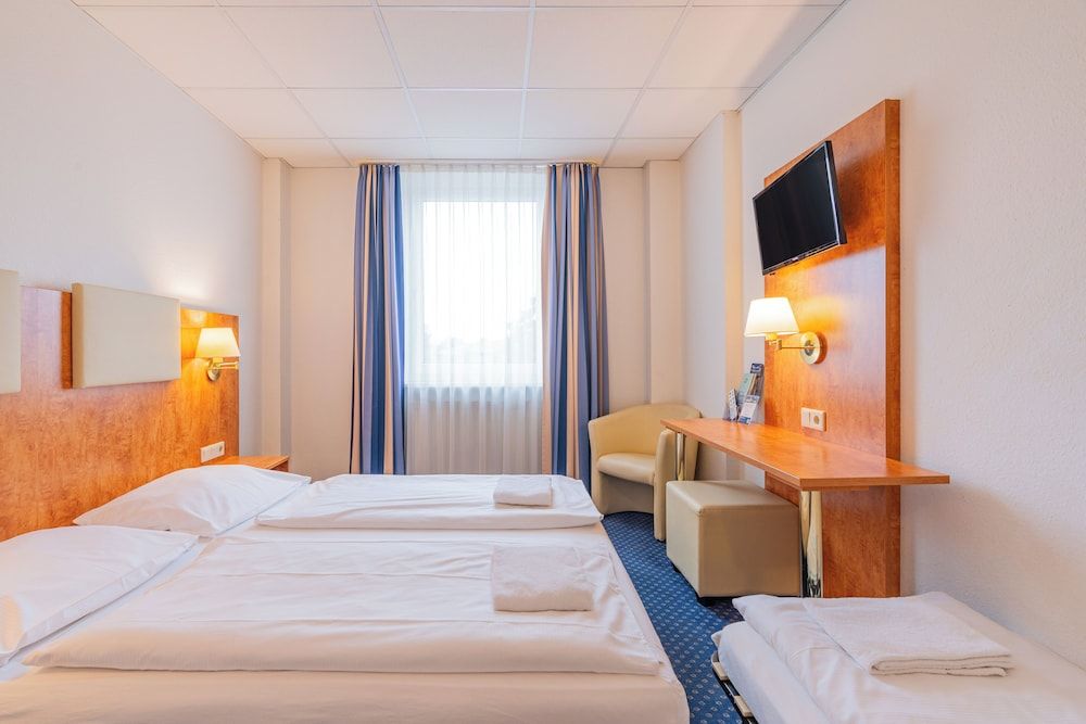 Bild von Classic-Dreibettzimmer