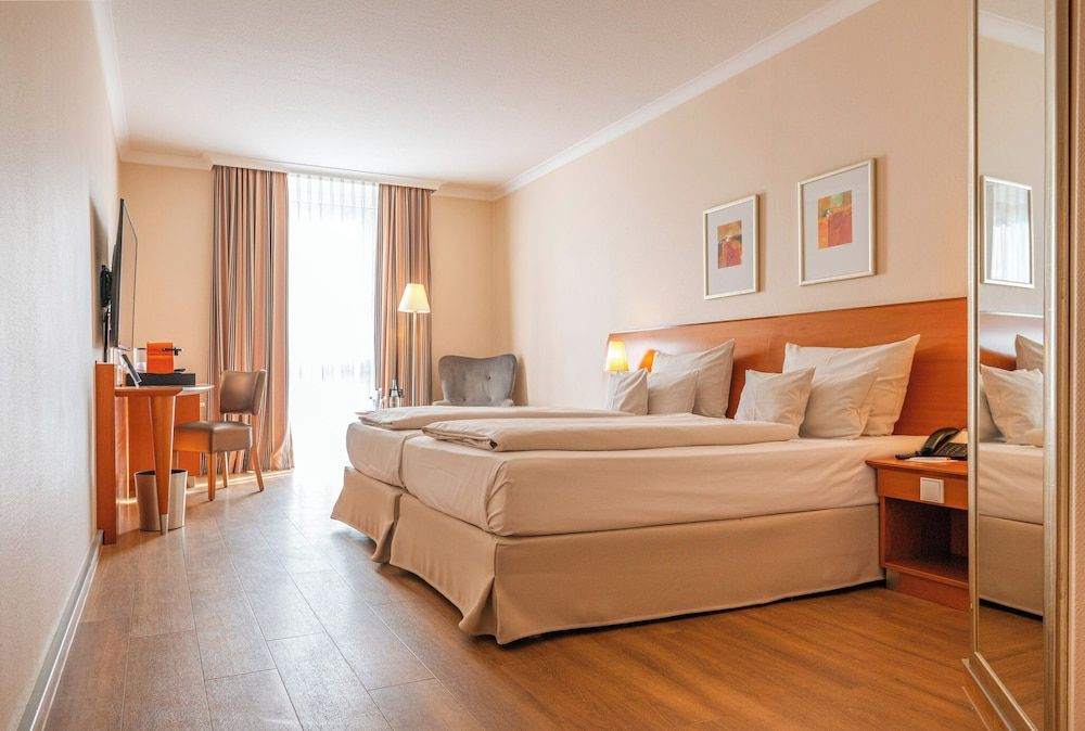 Bild von Comfort-Zimmer, 2 Einzelbetten, Gartenblick