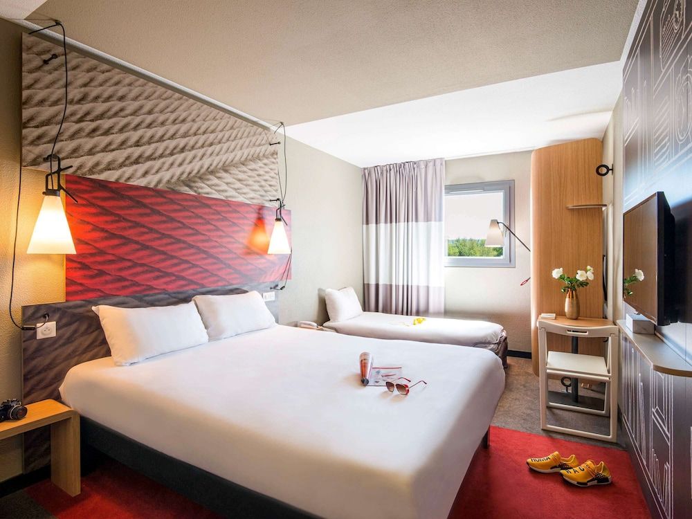 Bild von Chambre triple avec 1 lit double et 1 lit d'appoint
