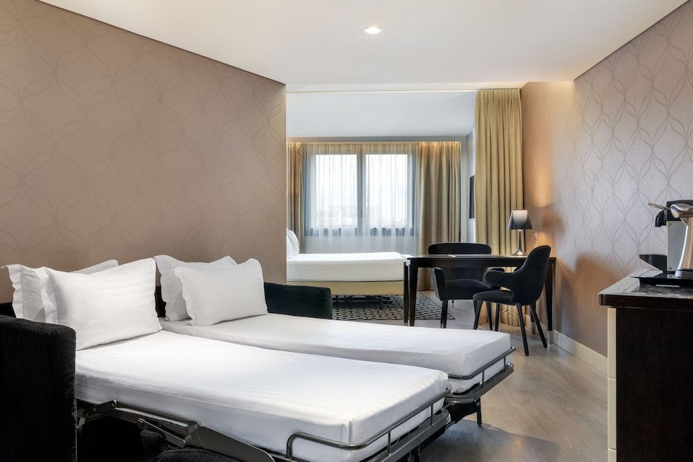 Bild von Familienzimmer, 1 King-Bett und Schlafsofa