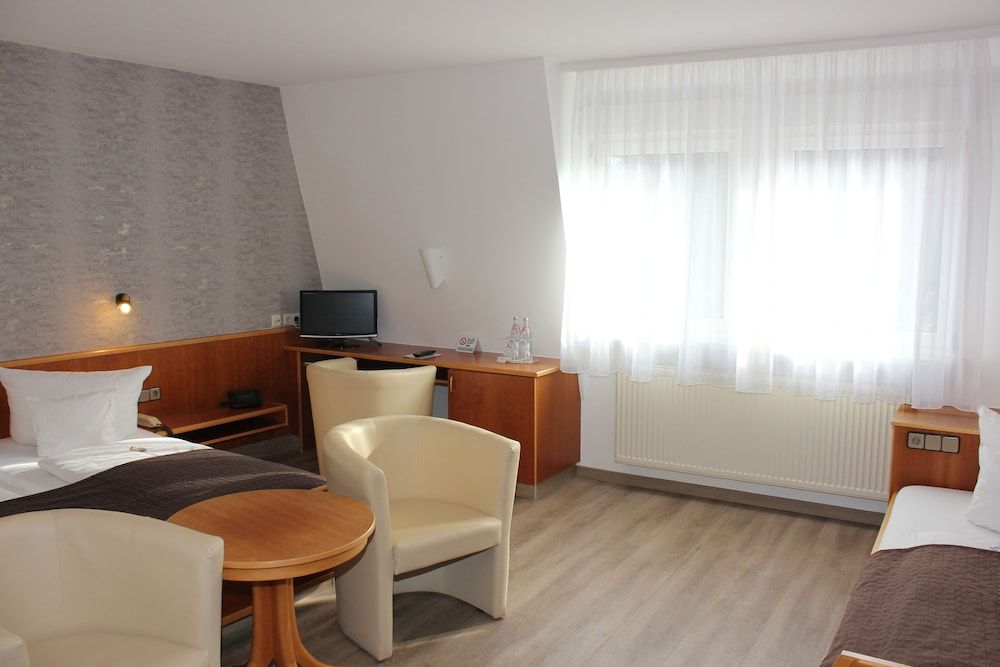 Bild von Comfort-Dreibettzimmer, Mehrere Betten