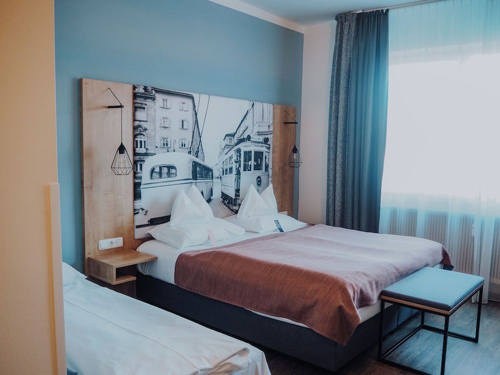 Bild von Dreibettzimmer