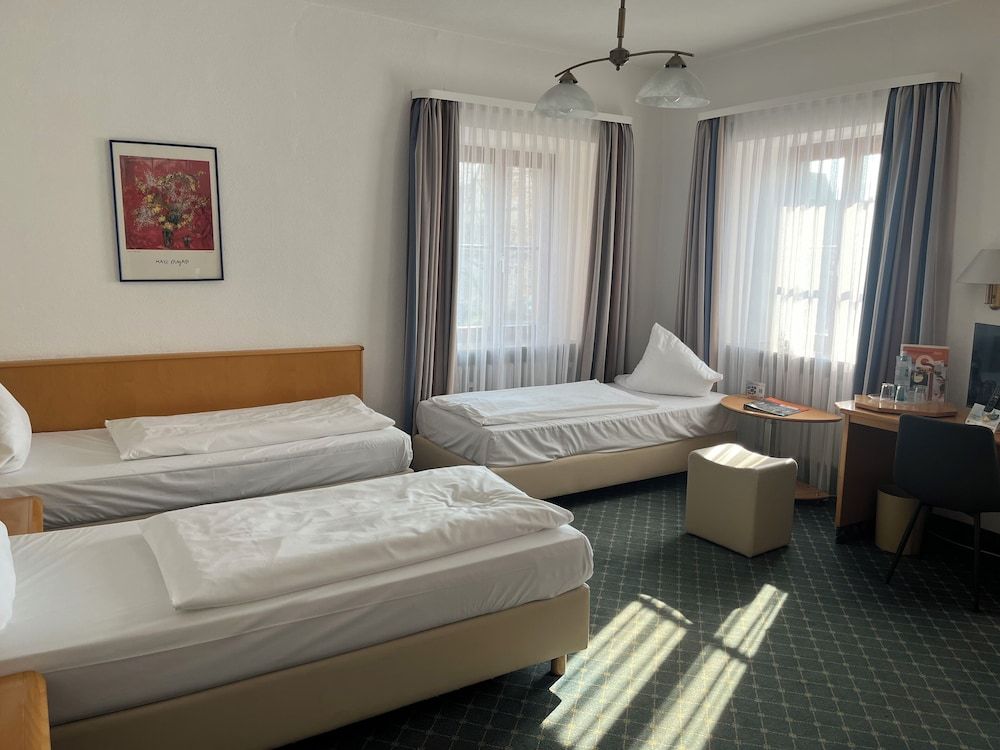 Bild von Dreibettzimmer
