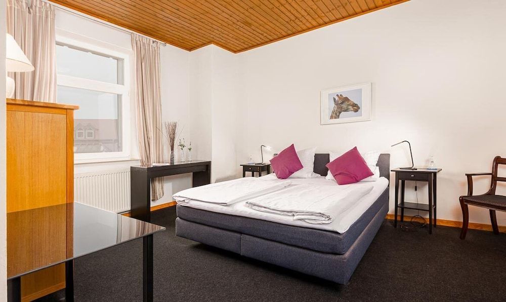 Bild von Dreibettzimmer