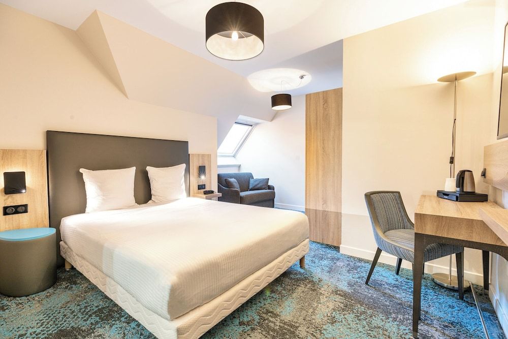 Bild von Dreibettzimmer, 1 Queen-Bett und Schlafsofa