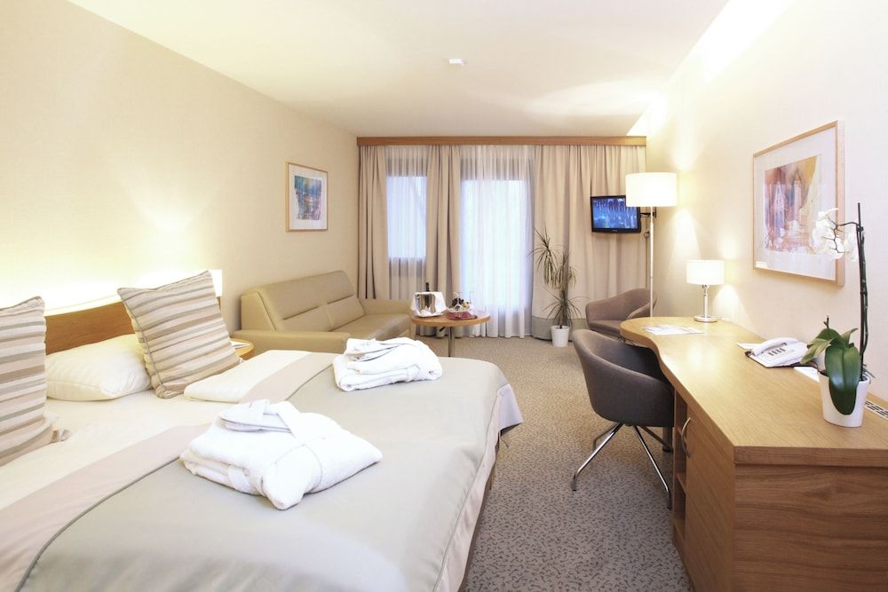 Bild von Comfort-Vierbettzimmer, Balkon, Gartenblick