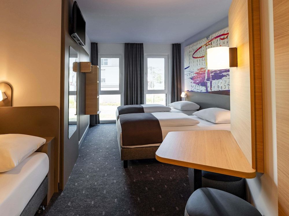 Bild von Dreibettzimmer