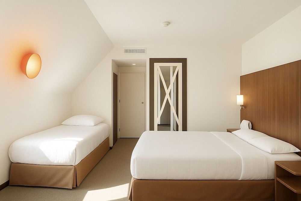 Bild von Standardzimmer, Mehrere Betten