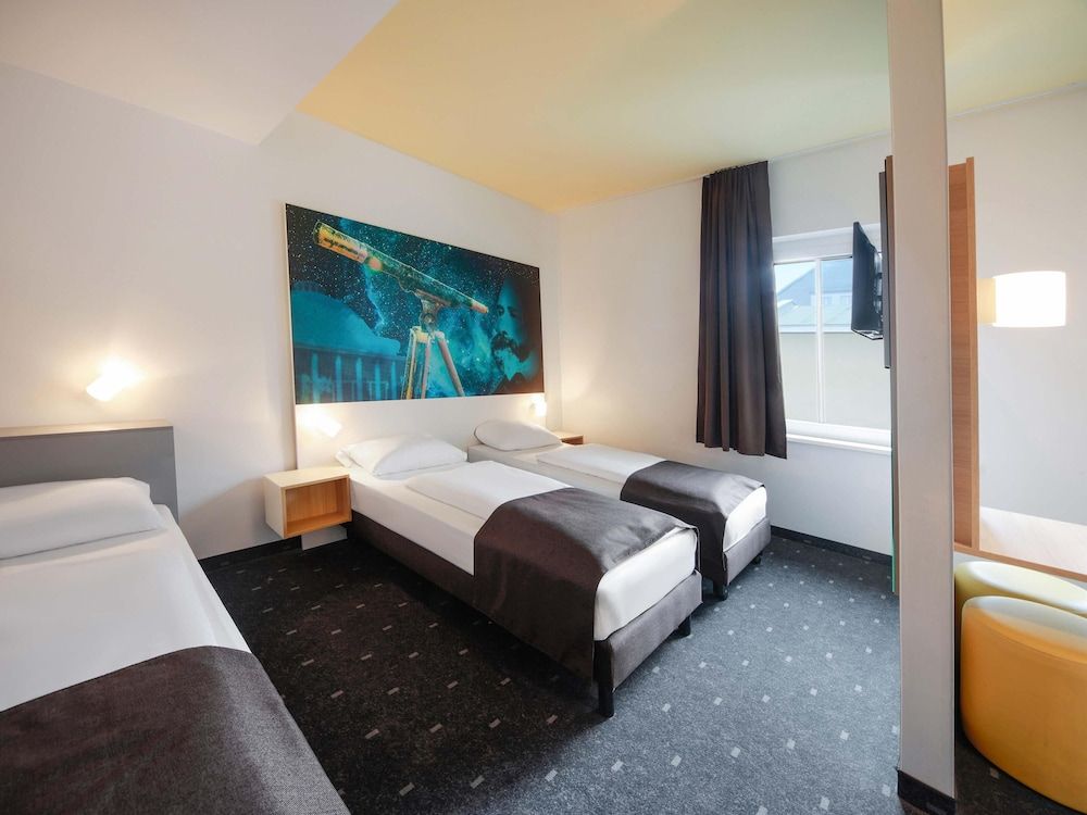 Bild von Dreibettzimmer