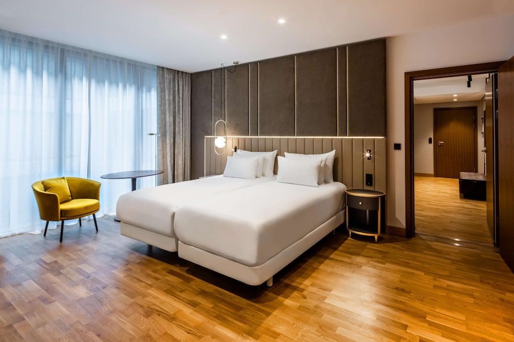 Bild von Basic-Zimmer (Atrium Room w/Extra Bed 2 Ad + 1 Ch)